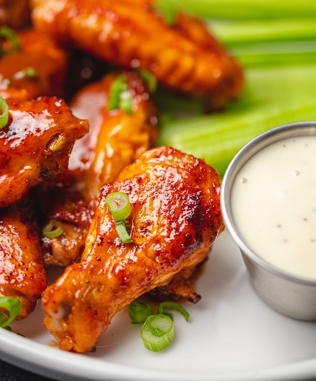 Chicken wings on a plate.
