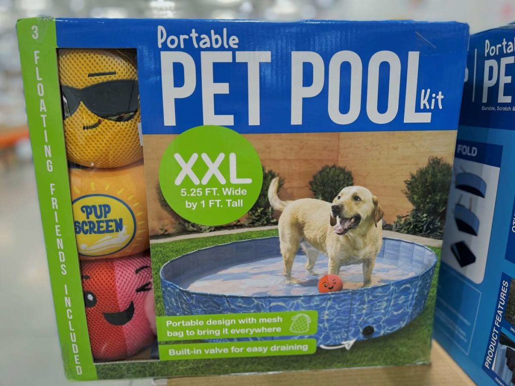 Packaging showing pet pool with a yellow Lab playing in water.